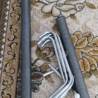 چوب رختی واتو کار کرده با یک کابینت کشویی