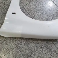 گلگیر جلو سمت راننده 206 سفید کوره ای