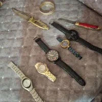 ساعت و چاقو و بدلیجات