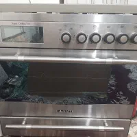 ماشین لباسشویی ال جی ۸ کیلویی و عدد گاز تمام فر