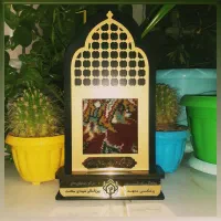 قاب و تابلووتندیس فرش حرم امام رضا طرح پنجره فولاد