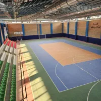 سرایدار آقا و نیروی خدماتی خانم در مجموعه ورزشی