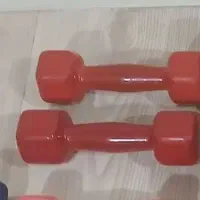 دمبل و کش ورزشی