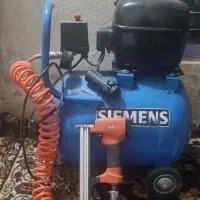 پمپ باد همراه با منگنه کوب