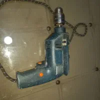 دریل ومینی سنگ وتعدادی وسایل بنایی و....