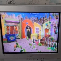 تلویزیون ۲۱ اینچ ،به همراه میز و دستگاه دیجیتال