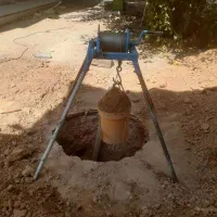 چاه کن فاضلاب پشته زنی وصل لوله فاضلاب