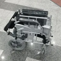 ویلچر طوسی مشکی بدنه آلومینیم چرخ ۱۲ ژله ای آکبند