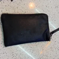 کیف جیبی با تعدادی کارت گم شده