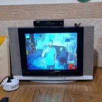 تلوزیون به همراه تمام لوازم جانبی.قیمت منصفانه