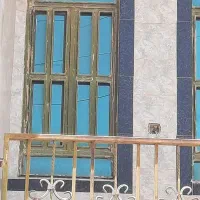 پنجره آهنی و درب پارکینگ