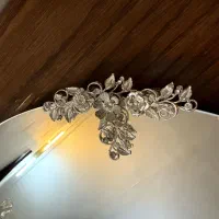 یک عدد اینه همراه با شمعدان