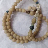 تسبیح نارگیل هسته خرما نقره کوب