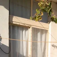 در چوبی  .  در  و  پنجره  اهنی