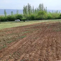 زمین بر جاده اصلی منطقه توریستی داسداران