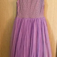 لباس مجلسی|لباس|مشهد, فتح المبین|دیوار