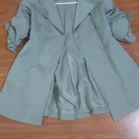 تعداد بسیار زیادی مانتو و لباس نو