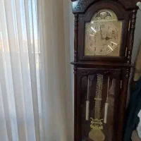 ساعت ایستاده و اینه کنسول
