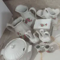 ظروف گل سرخ و استند قابلمه