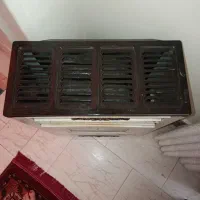 بخاری با دودکش|بخاری، هیتر، شومینه|اهواز, فرهنگ شهر|دیوار