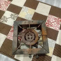 یک عدد اجاق گاز دو شعله چدنی