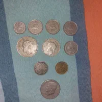 سکه آنتیک شاهنشاه و یک سکه دلار عتیقه امریکایی