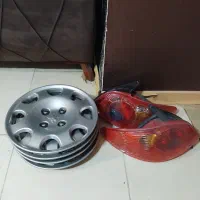 دوتا چراغ عقب ۲۰۶  با کیت چهارتا قالپاق