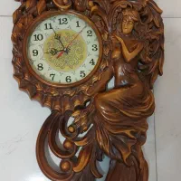 ساعت دیواری چوب گردو طرح فرشته