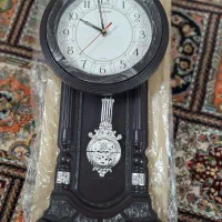 ساعت دیواری آونگ دار نو مناسب کادوی روز مادر