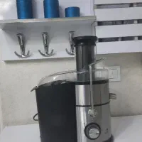 چرخ گوشت و اب میوه گیری