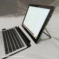 قوی تر از سرفیس ۷ تبلت لپتاپ cpu i7 رم۱۶ قلم کیبرد