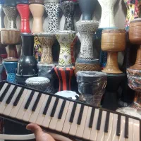 ساز بادی ملودیکا مدل کالیمبا دف تمپو ضرب خرید