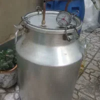 دستگاه تقطیر 100لیتری همراه کندانسور آبی و برقی