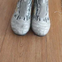 دوجفت کفش استوک مناسب چمن طبیعی و مصنوعی در حد نو