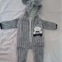 لباس سرهمی گرم و نرم برای نوزاد ورق بزنید