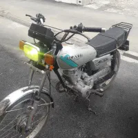 موتور هندا ملی پلاک بنام و سوزوکی پرچم