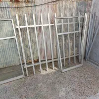 پنجره آلمینیومی با توری و حفاظ