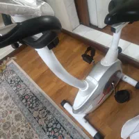 دوچرخه ثابت تایتان فیتنس درحد نونو
