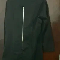 مانتو مشکی و مانتو جلو بسته|لباس|قم, قلعه کامکار|دیوار