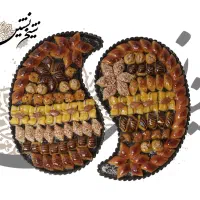 کارگر در کارگاه تولیدی شیرینی( قنادی)