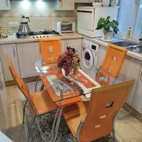 میز و صندلی شیشه ای ناهار خوری چهار نفری