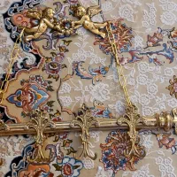 آویز لباس برنز فرشته|بندرخت و رخت‌آویز|قم, قلعه یزدیها|دیوار