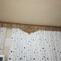 کتیبه بالا پرده