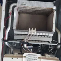 تعمیرات تضمینی انواع پکیج آبگرمکن و گاز صفحه ای|خدمات پیشه و مهارت|یزد, |دیوار