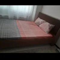 تخت خواب .میز تلویزیون.