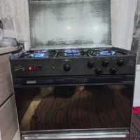 اجاق گاز فر دار جوجه گردان پیلوت