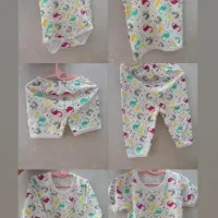 ست ۸ تیکه نوزادی نخی نو و چوب لباسی