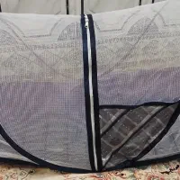 پشه بند .آغوش نوزاد