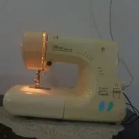 چرخ خیاطی دکمه ای