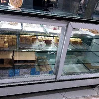 ویترین مغازه ام دی اف با شیشه ۱۰ میل